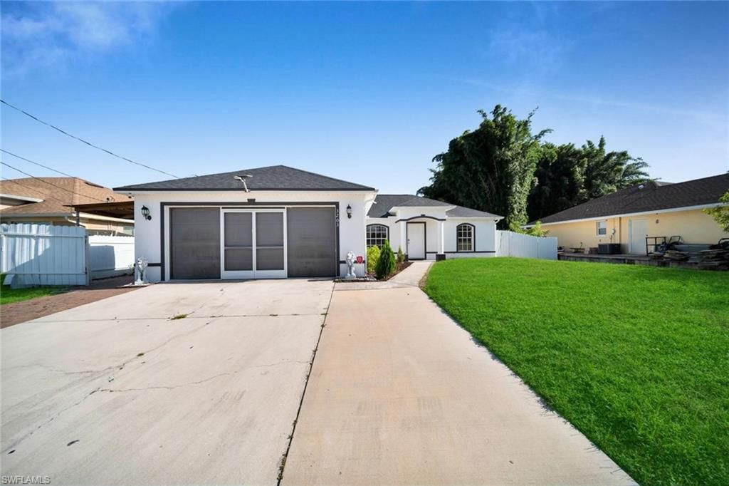 3203 36th ST SW, LEHIGH ACRES, FL 33976 — exterior