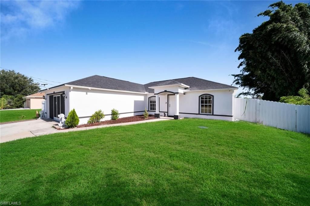 3203 36th ST SW, LEHIGH ACRES, FL 33976 — photo 2