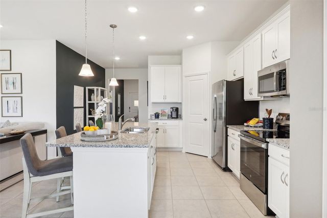 23599 GRINDSTONE WAY, Sorrento, FL 32776