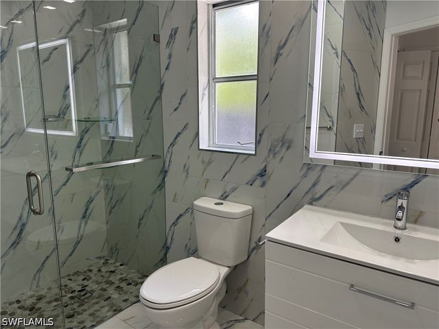 101 Edward AVE, Lehigh Acres, FL 33936