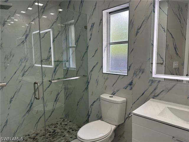 101 Edward AVE, Lehigh Acres, FL 33936