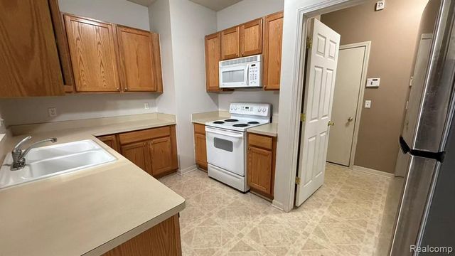 9107 Addington Drive, Walled Lake, MI 48390