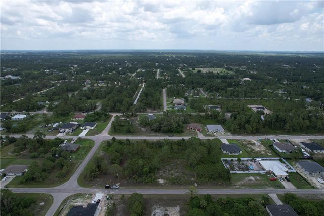 1056 JAGUAR BOULEVARD, Lehigh Acres, FL 33974