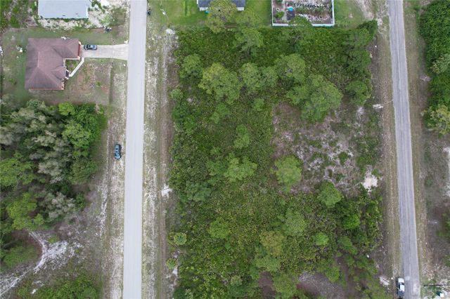 1056 JAGUAR BOULEVARD, Lehigh Acres, FL 33974