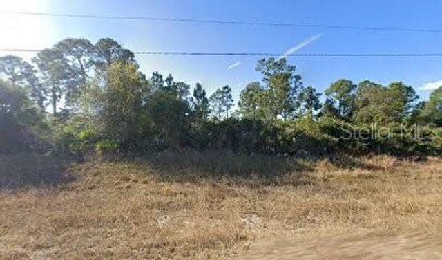 1056 JAGUAR BOULEVARD, Lehigh Acres, FL 33974