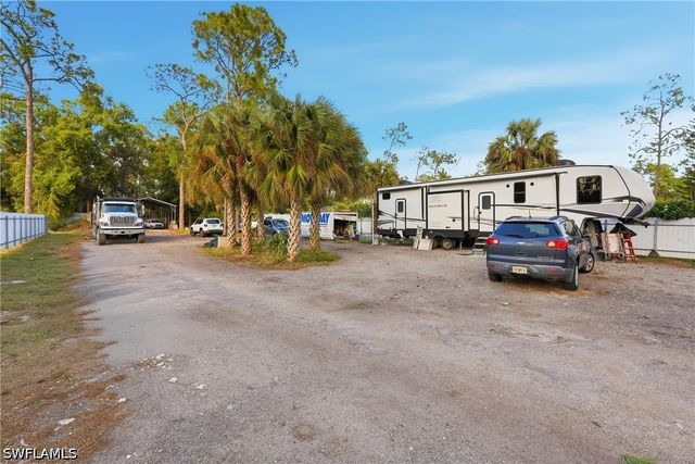 6005 Star Grass LN, Naples, FL 34116