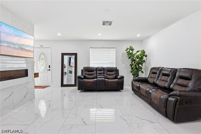 6005 Star Grass LN, Naples, FL 34116
