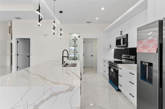 3419 16th ST SW, Lehigh Acres, FL 33976