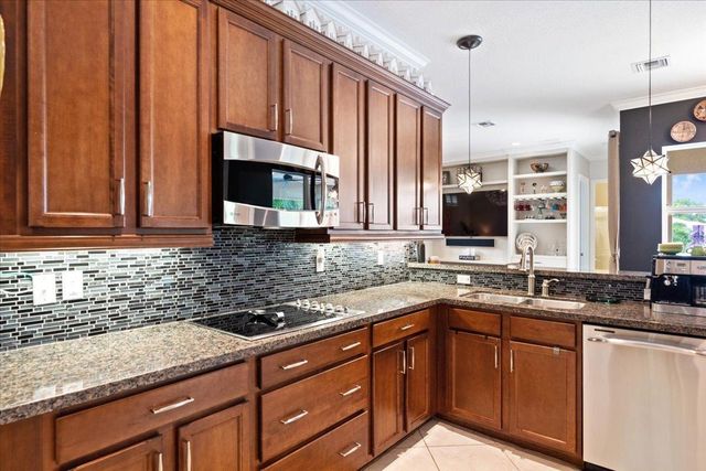 8152 Butler Greenwood Drive, Royal Palm Beach, FL 33411