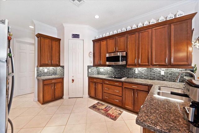8152 Butler Greenwood Drive, Royal Palm Beach, FL 33411