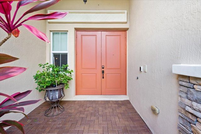 8152 Butler Greenwood Drive, Royal Palm Beach, FL 33411