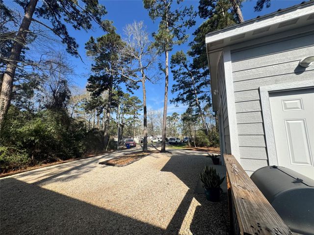 939 Whisperwood Drive, Onalaska, TX 77360