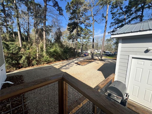 939 Whisperwood Drive, Onalaska, TX 77360