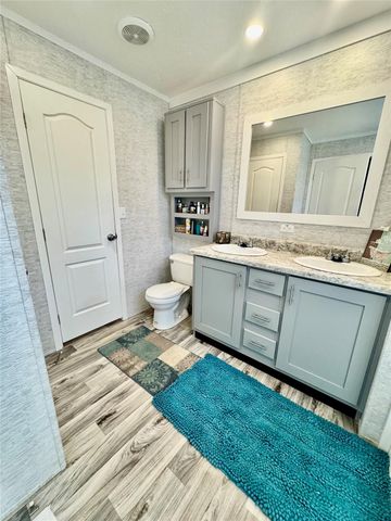 939 Whisperwood Drive, Onalaska, TX 77360