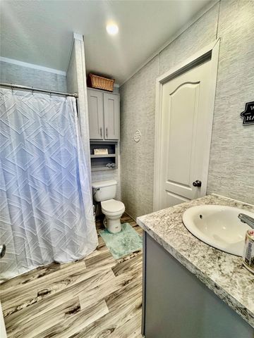939 Whisperwood Drive, Onalaska, TX 77360