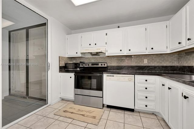 671 NE 195th Street 114E, Miami, FL 33179