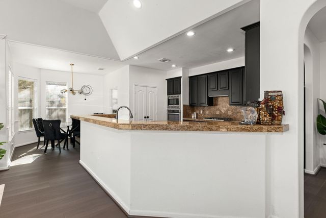 14910 Lake Woodbridge Court, Sugar Land, TX 77498
