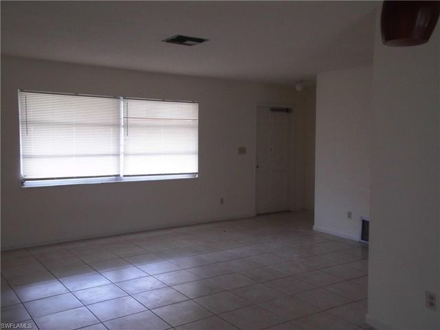 242 S Lake DR, Lehigh Acres, FL 33936