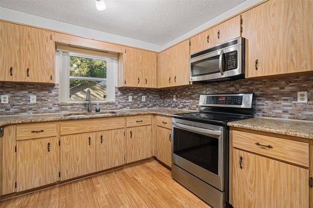 9277 SW 83RD AVENUE F, Ocala, FL 34481