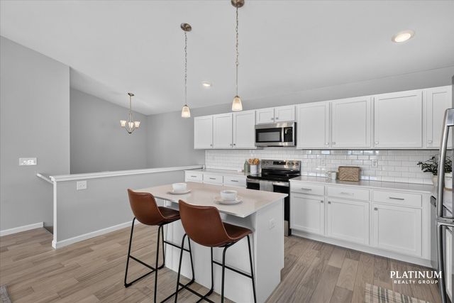217 Vansen Drive, Kent City Vllg, MI 49330