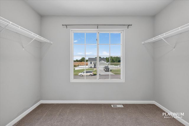 217 Vansen Drive, Kent City Vllg, MI 49330