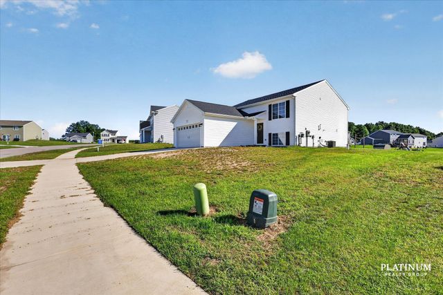217 Vansen Drive, Kent City Vllg, MI 49330
