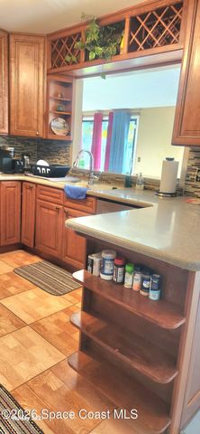 1327 Cherry Hills Road NE, Palm Bay, FL 32905