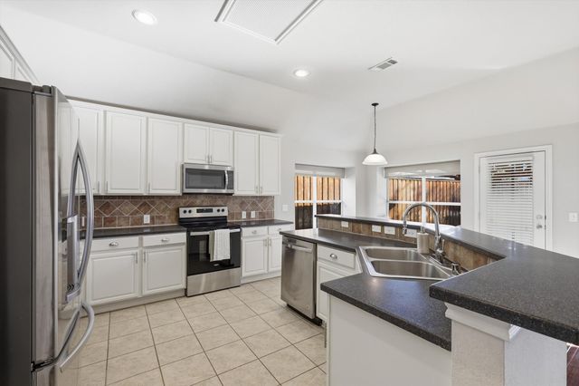 7716 Ravenhill Drive, Frisco, TX 75035