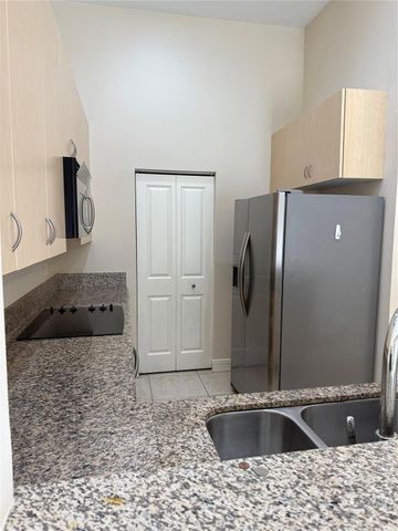 16102 Emerald Estates Drive 103, Weston, FL 33331