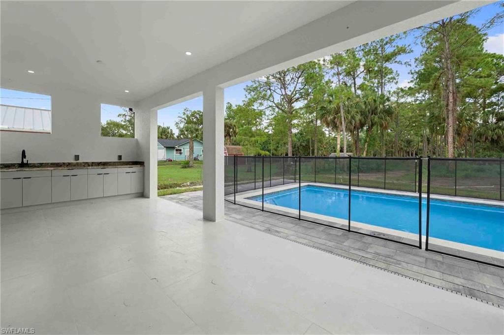 2610 4th ST NW, NAPLES, FL 34120 — photo 3