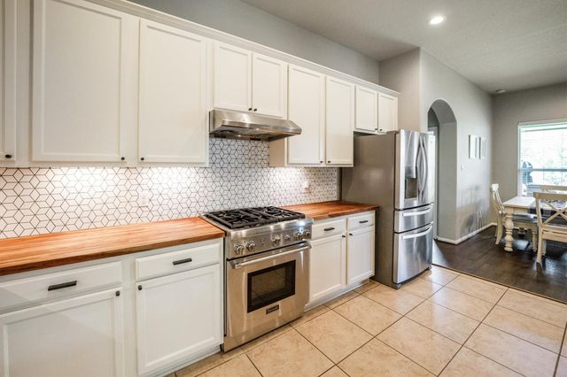 25227 Hawthorne Blossom Drive, Spring, TX 77389