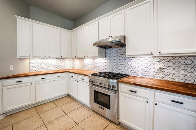 25227 Hawthorne Blossom Drive, Spring, TX 77389