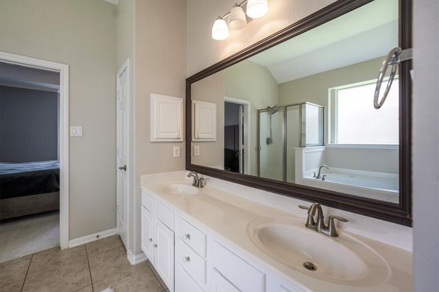 25227 Hawthorne Blossom Drive, Spring, TX 77389