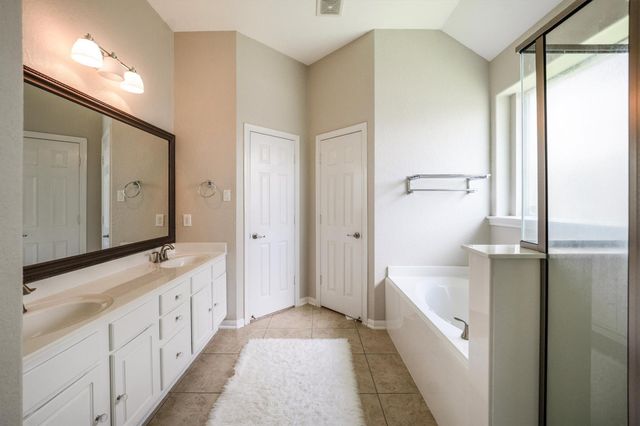 25227 Hawthorne Blossom Drive, Spring, TX 77389