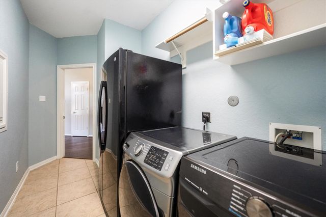 25227 Hawthorne Blossom Drive, Spring, TX 77389