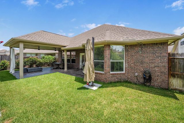 25227 Hawthorne Blossom Drive, Spring, TX 77389