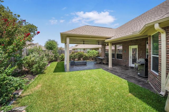 25227 Hawthorne Blossom Drive, Spring, TX 77389