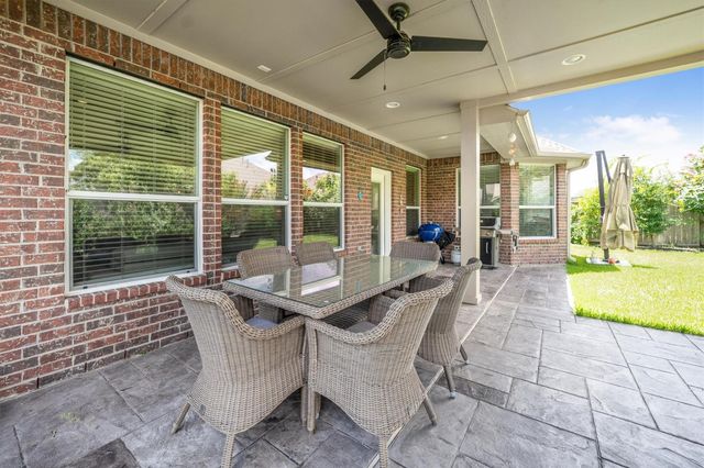 25227 Hawthorne Blossom Drive, Spring, TX 77389