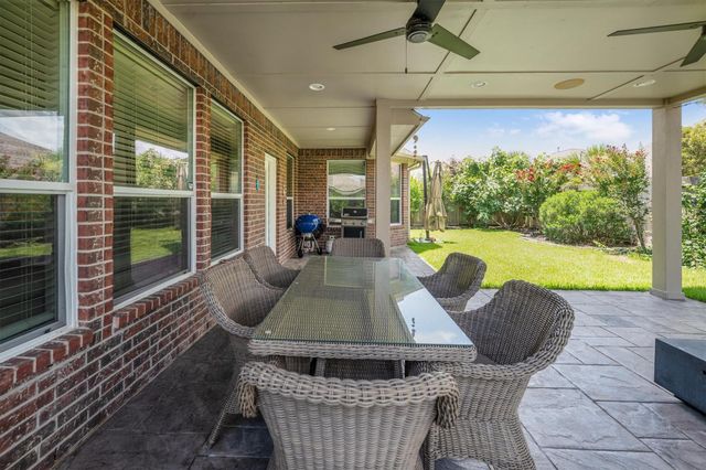 25227 Hawthorne Blossom Drive, Spring, TX 77389