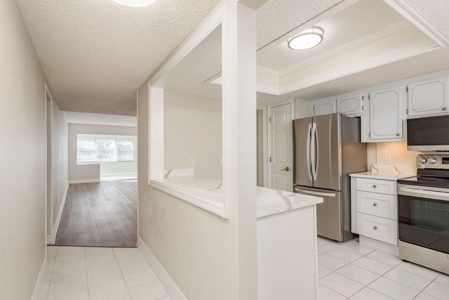 8 GLENCOE PLACE 104, Dunedin, FL 34698