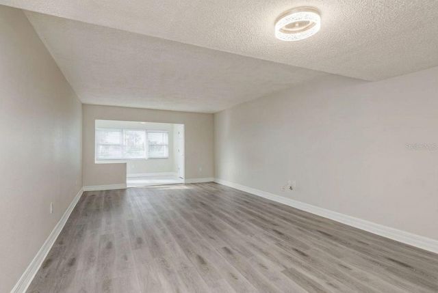 8 GLENCOE PLACE 104, Dunedin, FL 34698