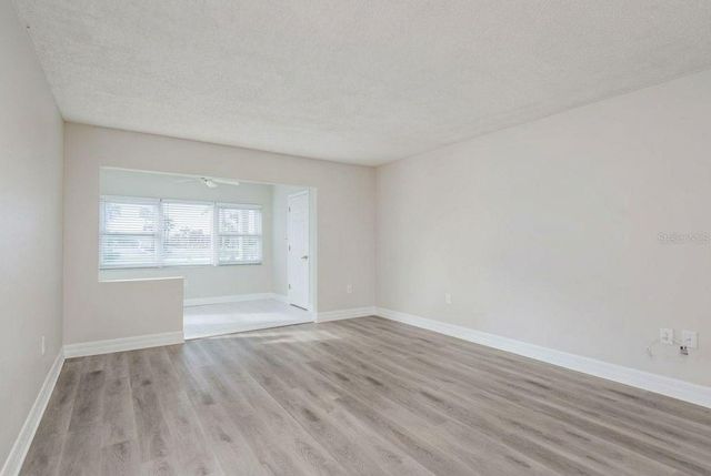 8 GLENCOE PLACE 104, Dunedin, FL 34698