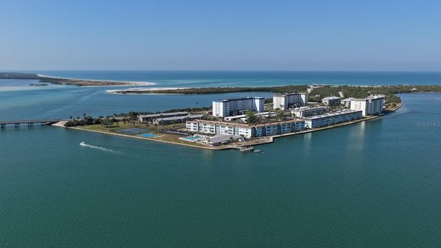 8 GLENCOE PLACE 104, Dunedin, FL 34698