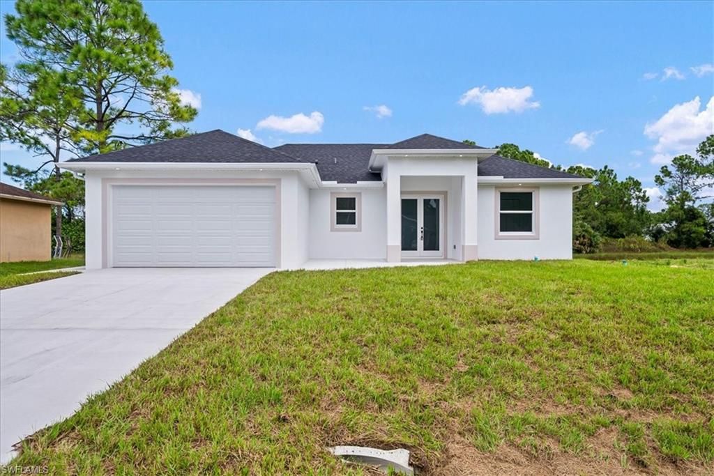 2910 16th ST W, LEHIGH ACRES, FL 33971 — photo 2