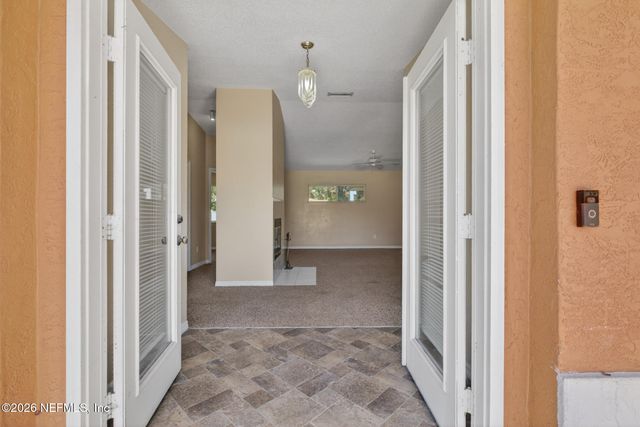 110 WHIPPOORWILL Drive, Palm Coast, FL 32164