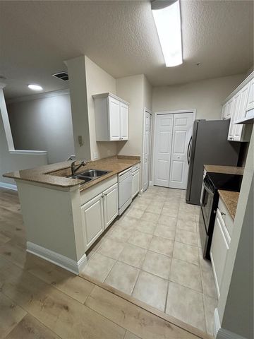 143 SOUTHERN PECAN CIRCLE 207, Winter Garden, FL 34787