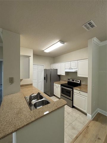 143 SOUTHERN PECAN CIRCLE 207, Winter Garden, FL 34787