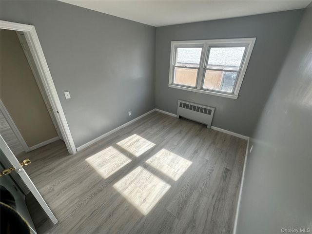 1371 Rosser Avenue, Elmont, NY 11003