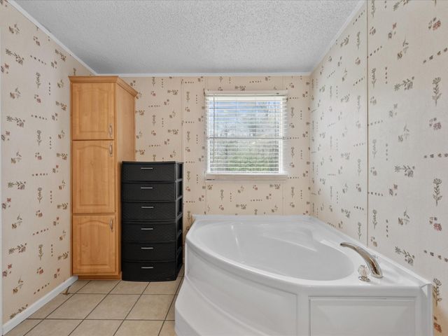 4 Ripple Creek Drive, Huntsville, TX 77320