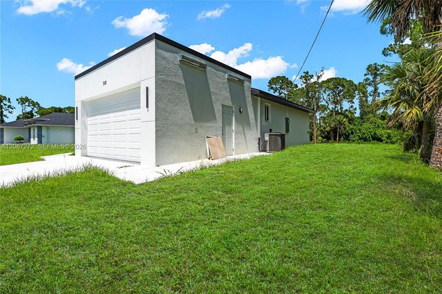 718 718 Robert Avenue, Lehigh Acres, FL 33936
